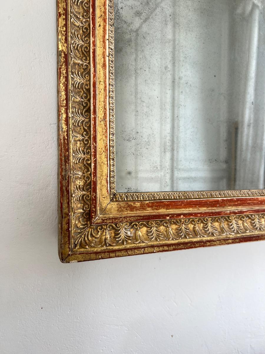 Miroir mercure époque Empire décor palmettes
