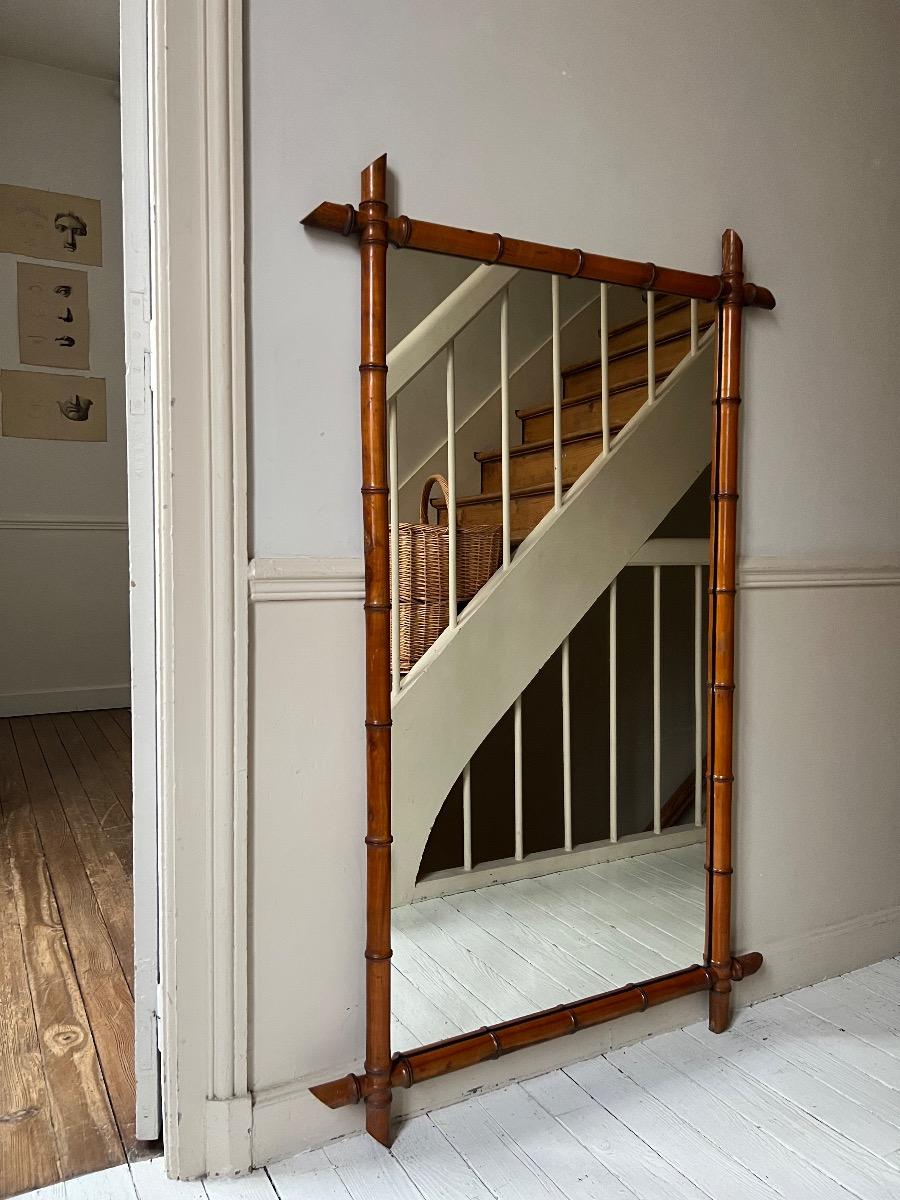 Grand miroir bois façon bambou 1920