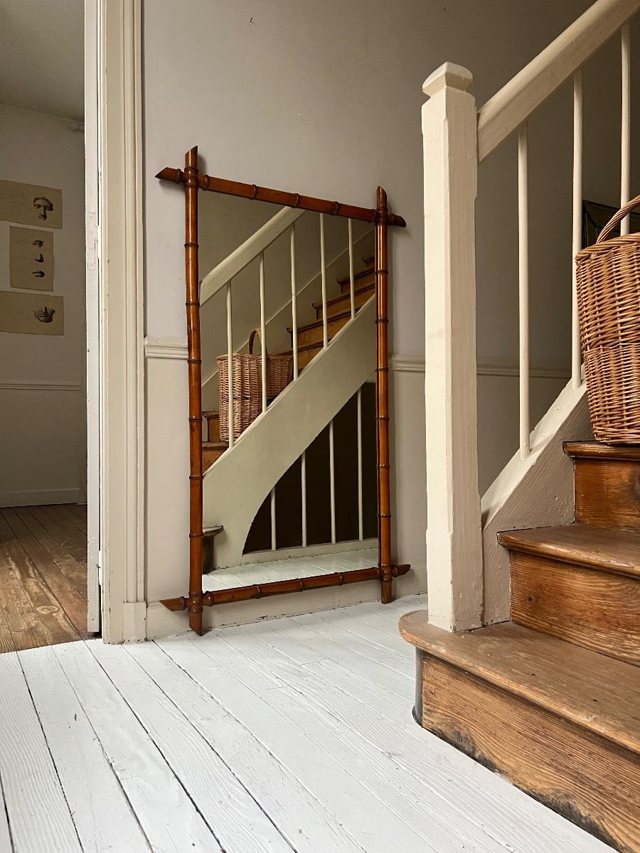 Grand miroir bois façon bambou 1920