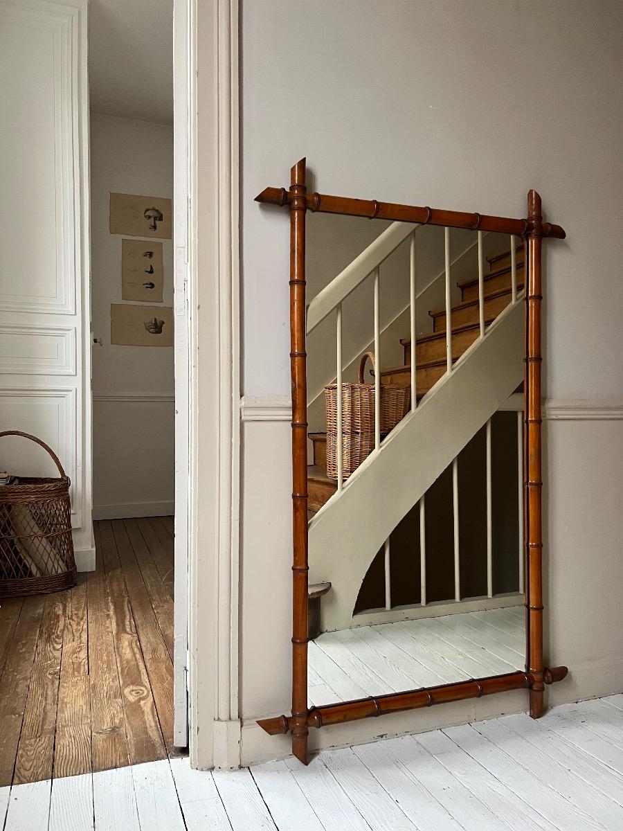 Grand miroir bois façon bambou 1920