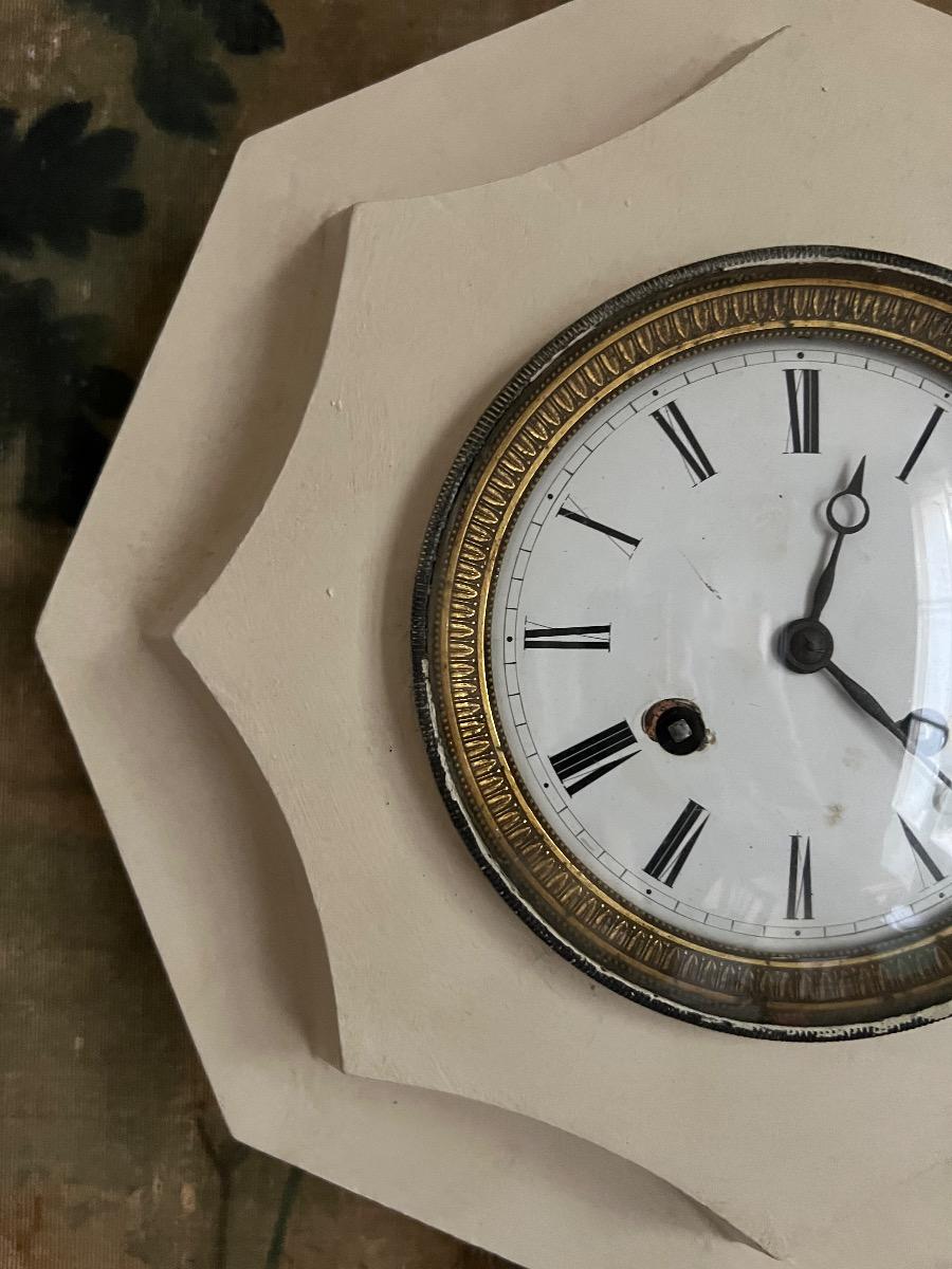 Horloge XIXème tôle peinte et bronze