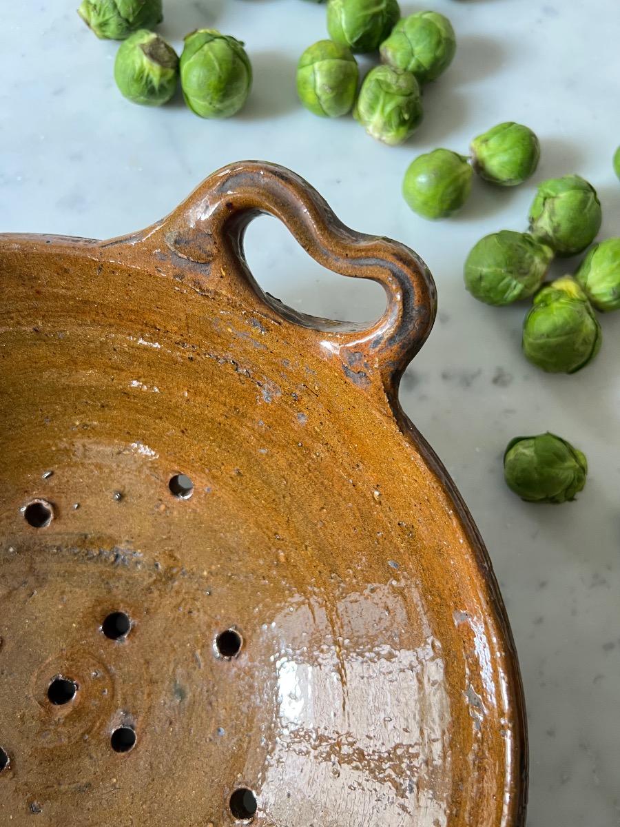 Égouttoir terre vernissée 1900