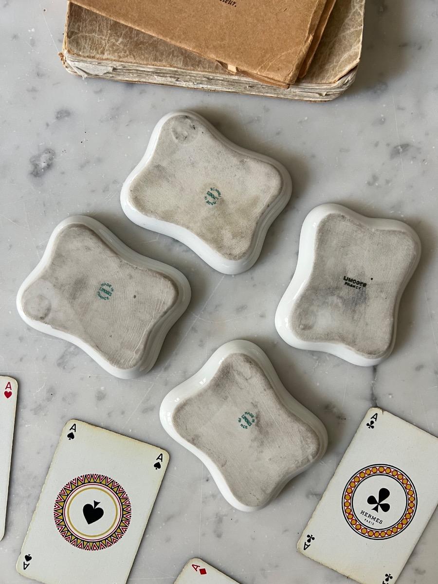 4 coupelles / cendriers à jeu porcelaine 1950
